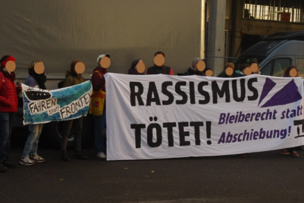 Aktivist*innen der IL Rhein-Neckar protestieren gegen Besuch von Olaf Scholz