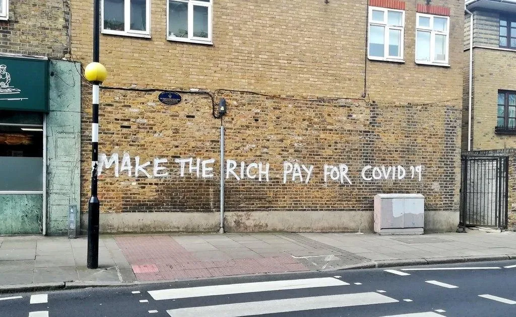 Grafitti Make the rich pay for Covid 19