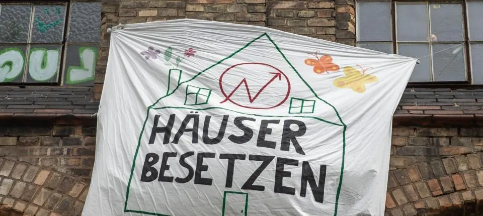 Transpi Häuser besetzen