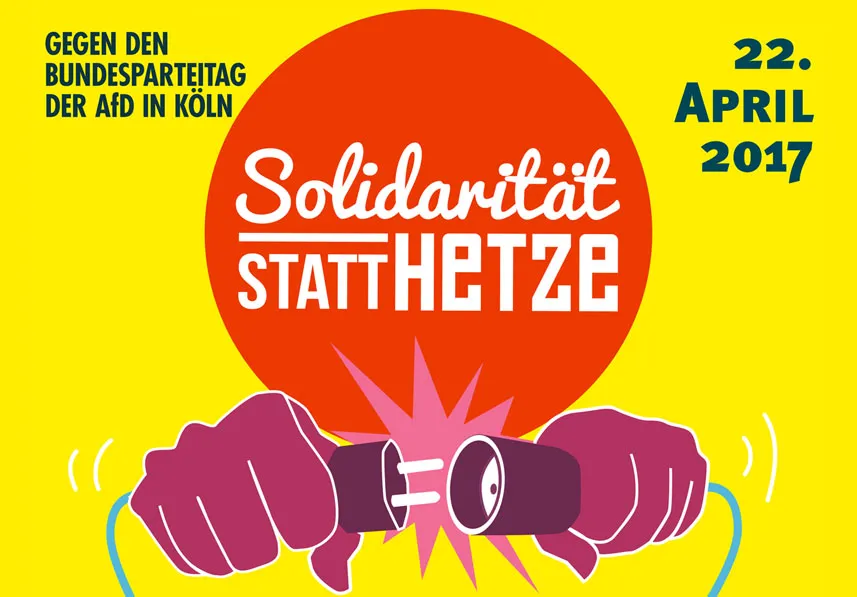 Solidarität statt hetze - zwei hände ziehen einen strom stecker auseinander