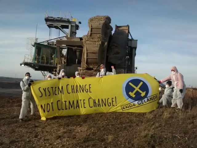 System change not climate change