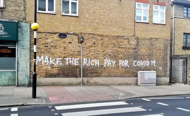 Grafitti Make the rich pay for Covid 19