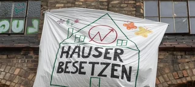 Transpi Häuser besetzen