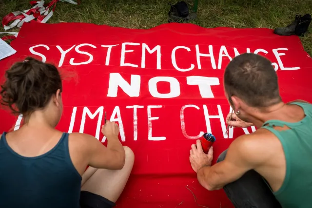 System change not climate change